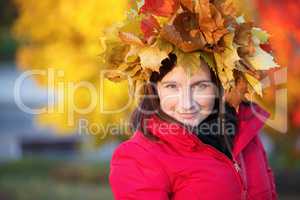 Woman with a wreath of maple leaves