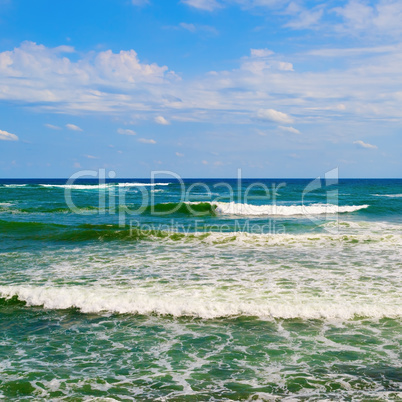 Blue sky and sea waves
