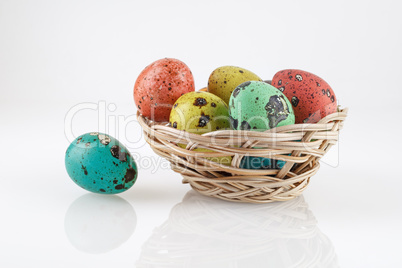 Quail eggs in a basket