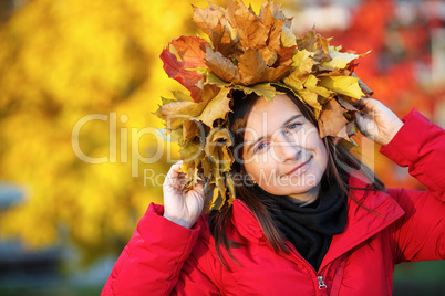Woman with a wreath of maple leaves
