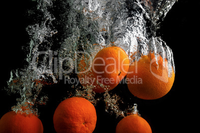 Tangerines in water