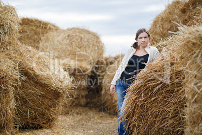 Woman and Haystacks