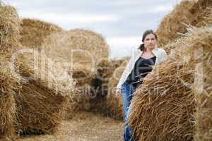 Woman and Haystacks