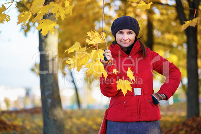 Woman in autumn park