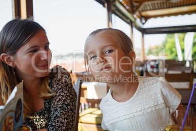 Daughter next to her mother