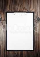 Clipboard with blank paper