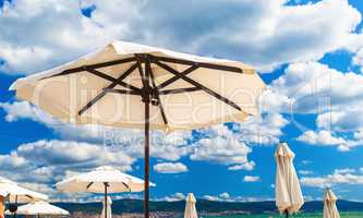 White beach parasols
