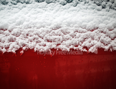 Snow on red background