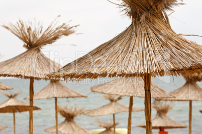 Straw beach umbrellas