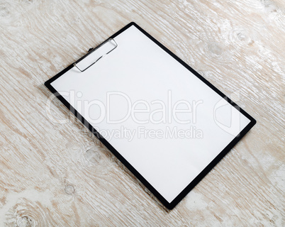 Clipboard with a blank paper