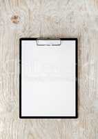 Clipboard with white paper