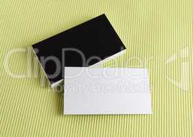 Business cards on a green background