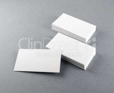 Blank business cards on gray