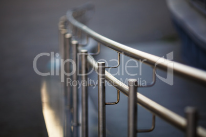 Chrome fence with handrail