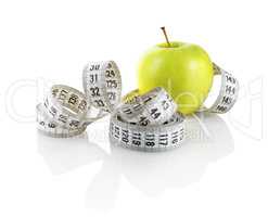 Apple with measuring tape