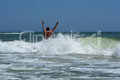 Man bathing in the sea