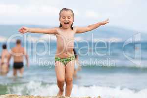 Laughing child on the beach