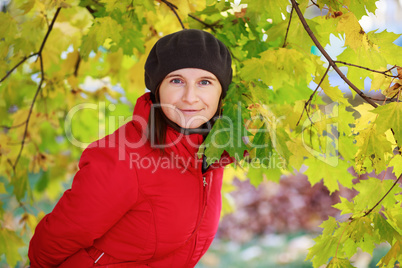 Woman and maple leaves