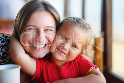 Happy mother and daughter