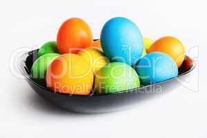 Easter eggs in black plate
