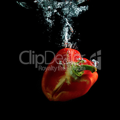 Half red pepper in water