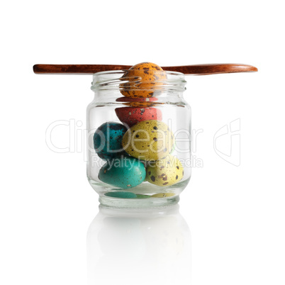 Quail eggs in a glass jar