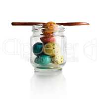 Quail eggs in a glass jar