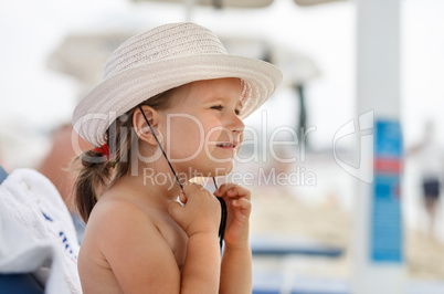 Baby girl and a hat