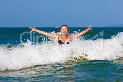 Woman in wave