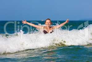Woman in wave