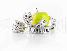Apple and measuring tape
