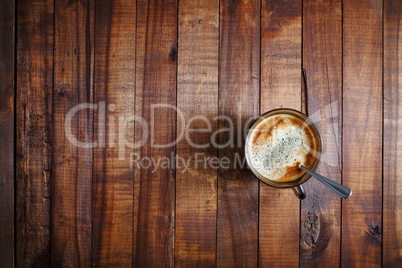 Coffee cup on wooden table