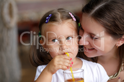 Baby drinks juice