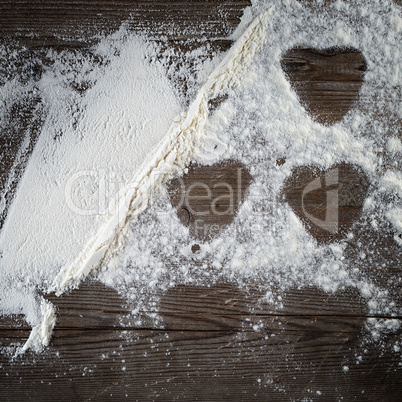 Flour on wooden surface