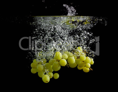 Green grapes in water