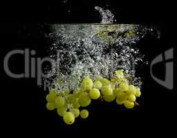 Green grapes in water