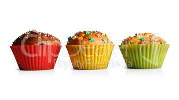 Cupcakes in colorful molds for baking