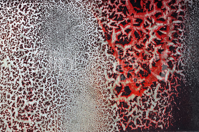 Cracked red paint on grunge metal surface - macro 18