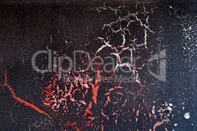Cracked red paint on grunge metal surface - macro 7