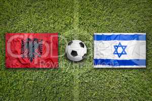 Albania vs. Israel flags on soccer field