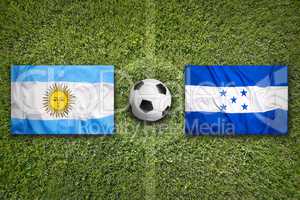 Brazil vs. Honduras flags on soccer field