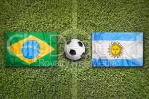 Brazil vs. Argentina flags on soccer field
