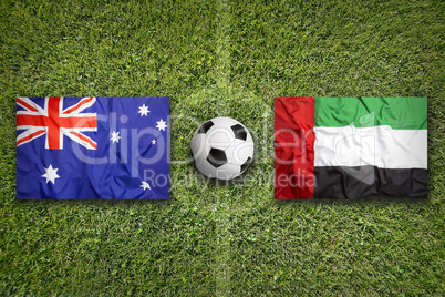 Australia vs. United Arab Emirates flags on soccer field