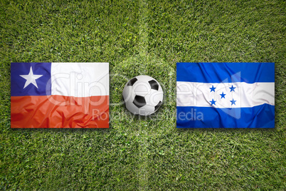 Chile vs. Honduras flags on soccer field