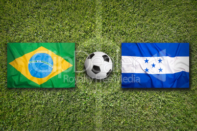 Brazil vs. Honduras flags on soccer field