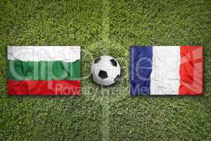 Bulgaria vs. France flags on soccer field