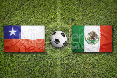 Chile vs. Mexico flags on soccer field