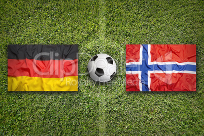 Germany vs. Norway flags on soccer field