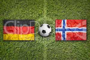 Germany vs. Norway flags on soccer field