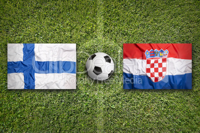Finland vs. Croatia flags on soccer field